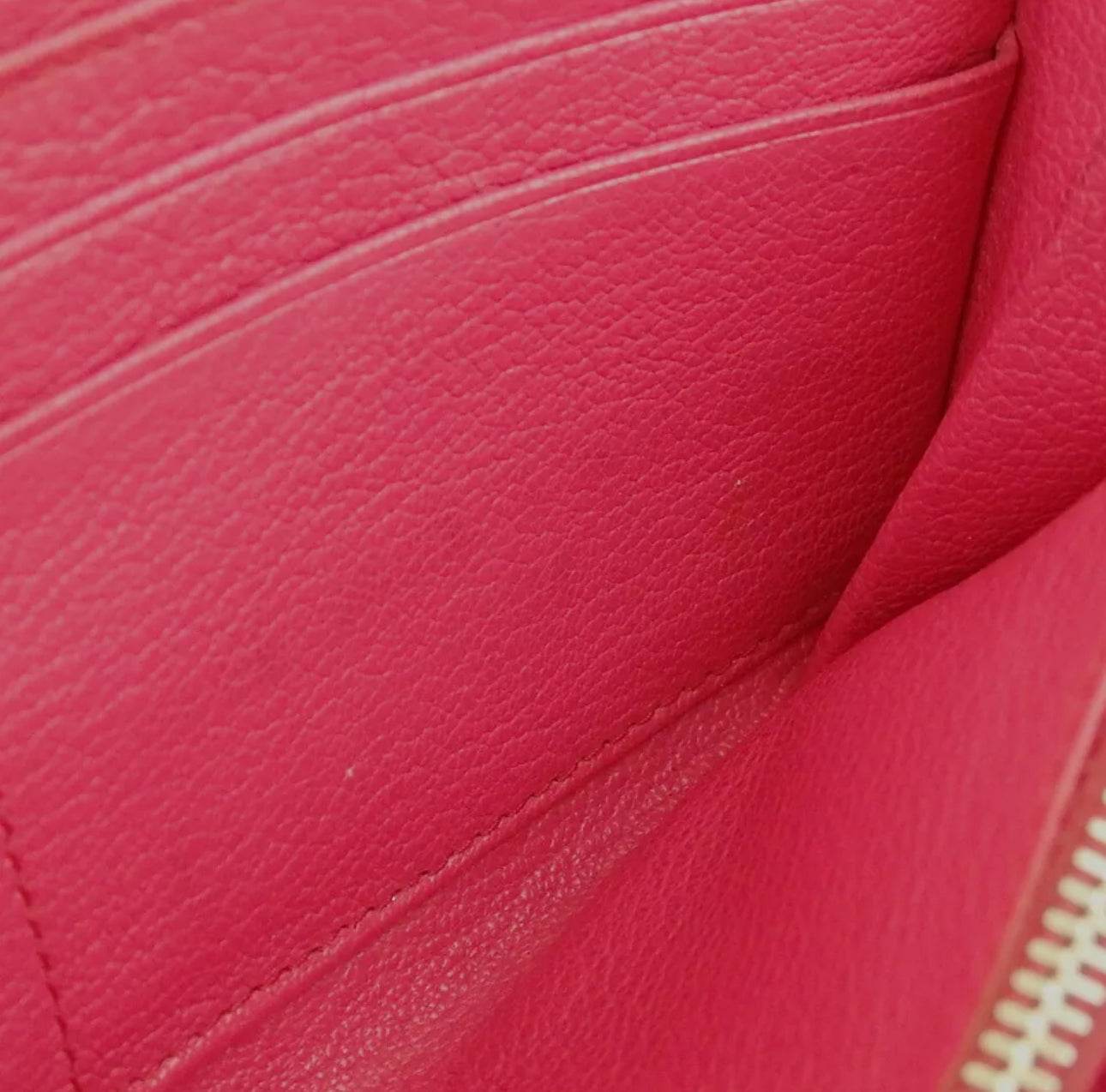 MIU MIU Pink Zip Around Continental Wallet in excellent condition - Luxbrandz