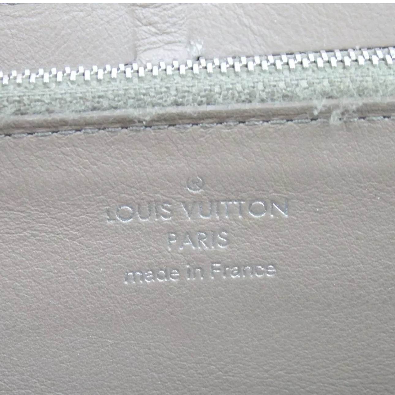 Authentic LOUIS VUITTON M61250 Portefeiulle Capsine purse leather in excellent condition - Luxbrandz