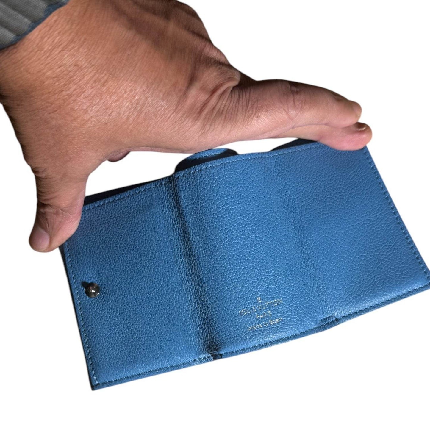 Louis Vuitton MiniLock Leather Wallet in new condition - Luxbrandz