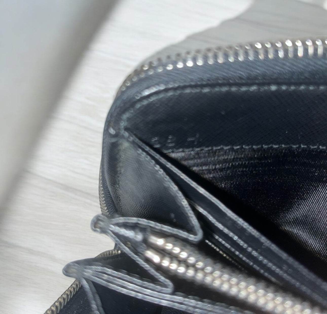 Prada Saffiano Active Black Leather Stripe Zip Around Wallet in mint conditions - Luxbrandz