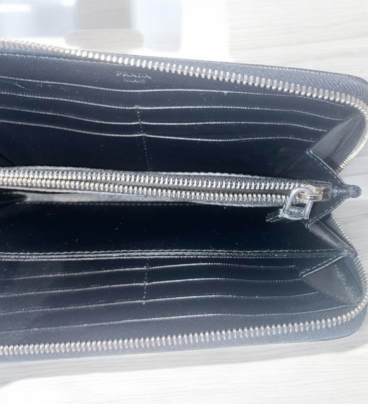 Prada Saffiano Active Black Leather Stripe Zip Around Wallet in mint conditions - Luxbrandz
