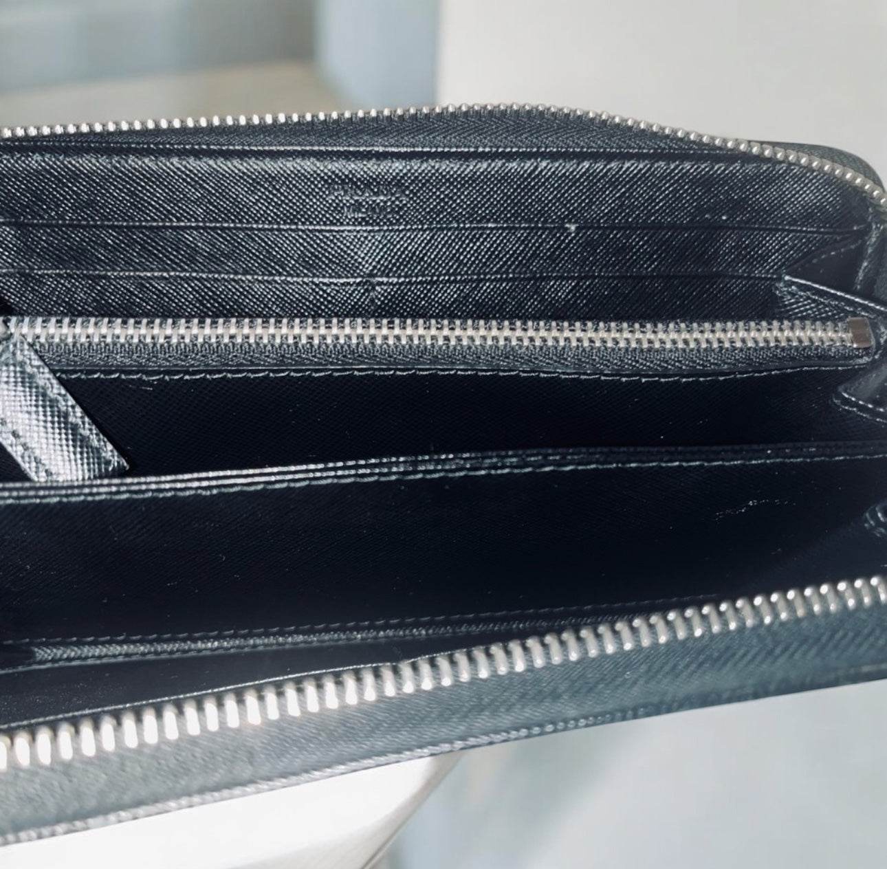 Prada Saffiano Active Black Leather Stripe Zip Around Wallet in mint conditions - Luxbrandz