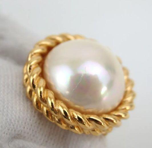 Christian Dior studded earring white pearl in the center in excellent condition.