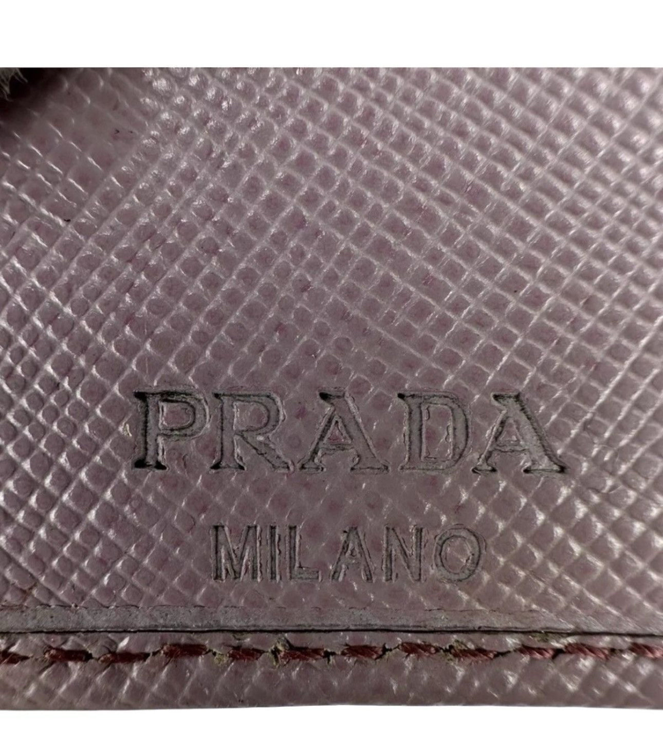 Prada Safiano Leather Pink Wallet for women in excellent used condition with Tra-angular metal Prada Logo